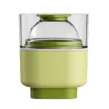 Clarify.pk silicone sphere ice mold in green and clear for making perfectly round ice balls