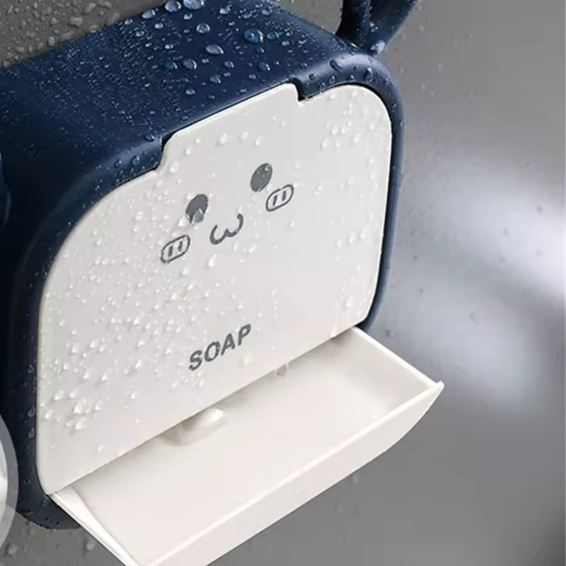 Single box wall mounted soap holder in navy blue and white with cute face design and water droplets