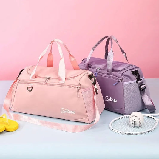 Unisex fitness training bag with shoe compartment in pink and purple by Clarify.pk with multiple pockets and detachable straps
