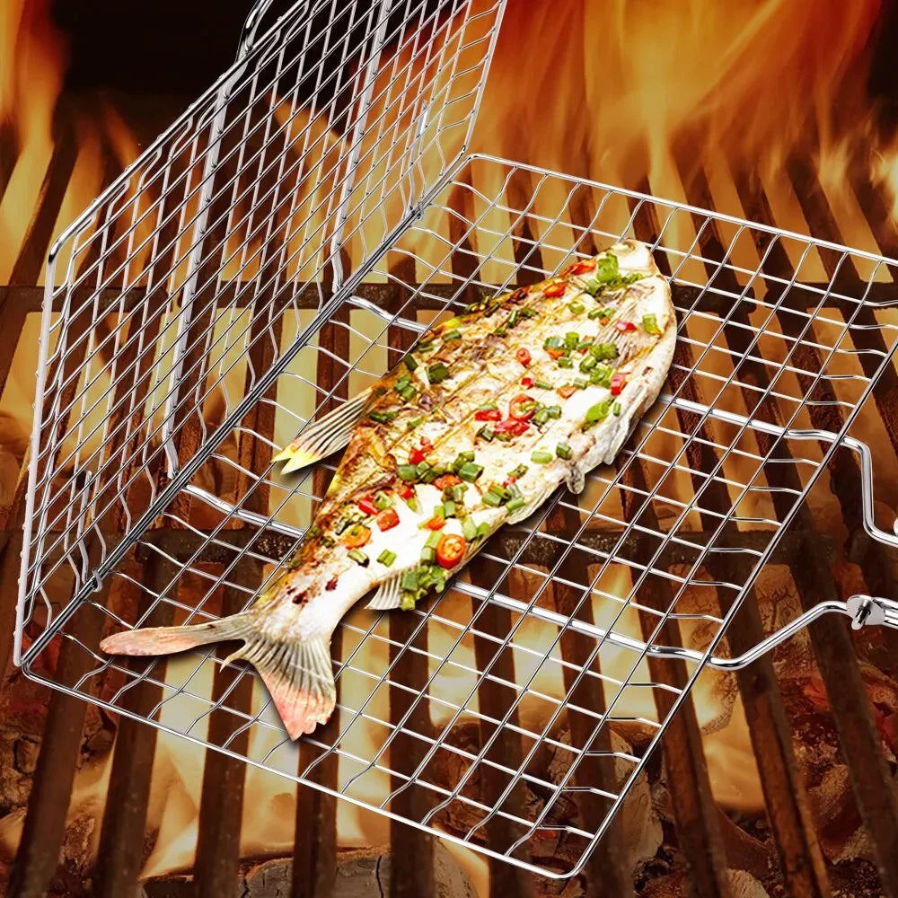 Grilled fish cooking on stainless steel BBQ grill with open mesh design over flames