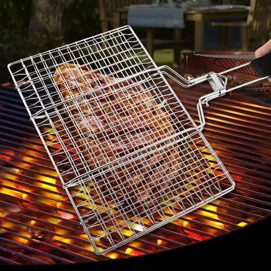 Stainless steel BBQ grill with meat grilling over open flames for outdoor cooking
