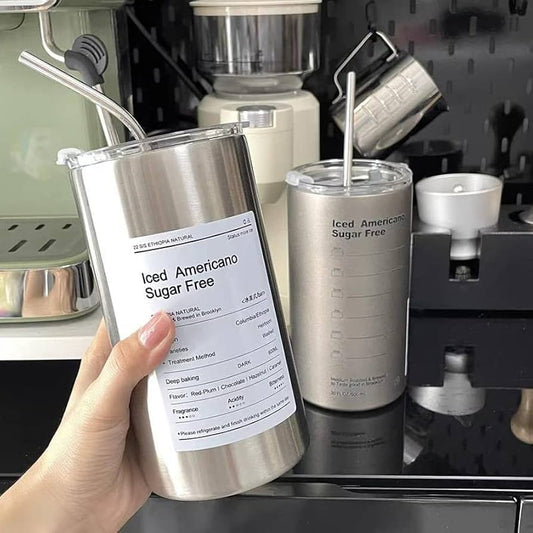 Clarify.pk stainless steel coffee tumbler with lid and straw holding iced Americano sugar free drink