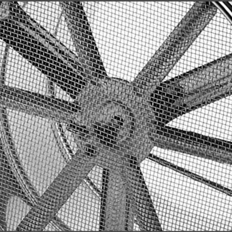 Close-up view of a stainless steel flour sieve mesh showing detailed wire grid