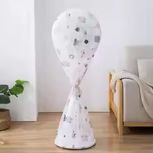 Clarify.pk white decorative stand fan protective cover with abstract pattern in living room