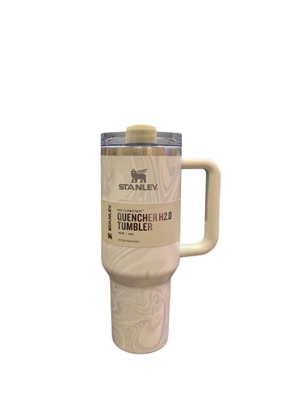 40oz stainless steel tumbler with handle in beige color featuring Stanley Quencher H2.0 design