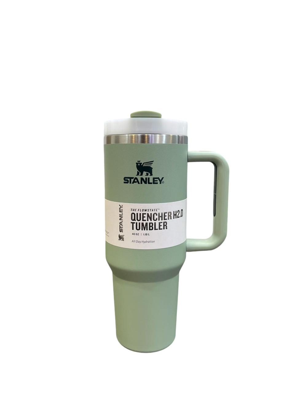 40oz stainless steel tumbler with handle in green color by Stanley for hot and cold drinks