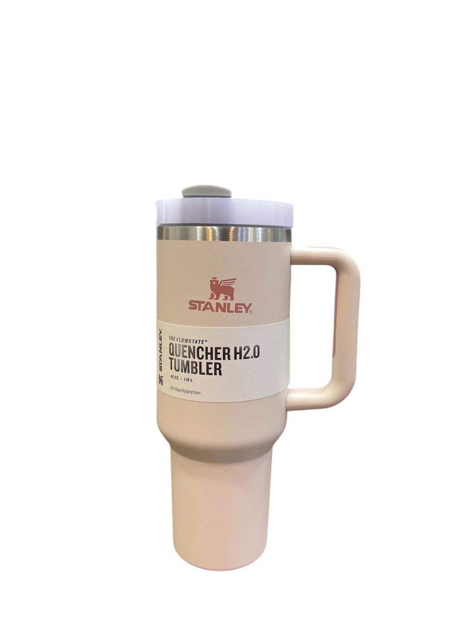 40oz stainless steel tumbler with handle in beige color by Stanley with lid and label