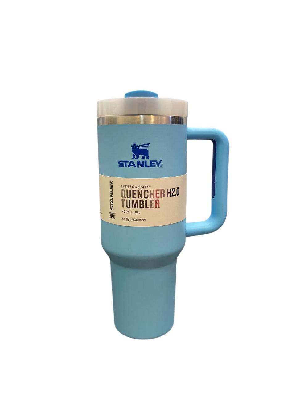 40oz stainless steel tumbler with handle in blue by Stanley with spill-resistant lid