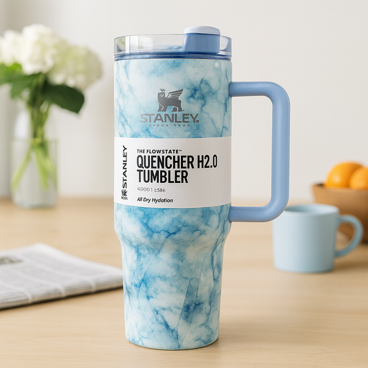 Stanley Quencher H2.0 TUMBLER in blue marble design with handle for all day hydration