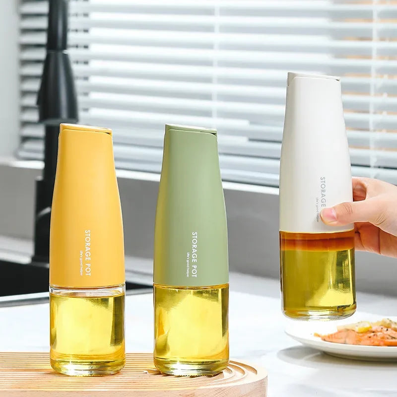 Set of three 500ml oil bottle for kitchen in yellow, green, and white with easy-pour design