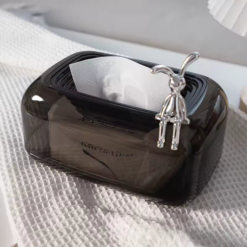 Clarify.pk stylish sunken tissue box organizer in translucent black with silver decorative figure on a white textured cloth