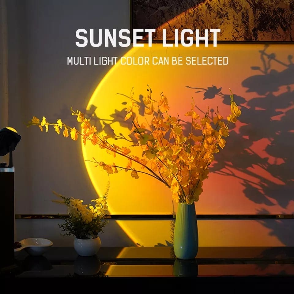 Sunset projector lamp for bedroom casting warm yellow light with decorative plants in vases