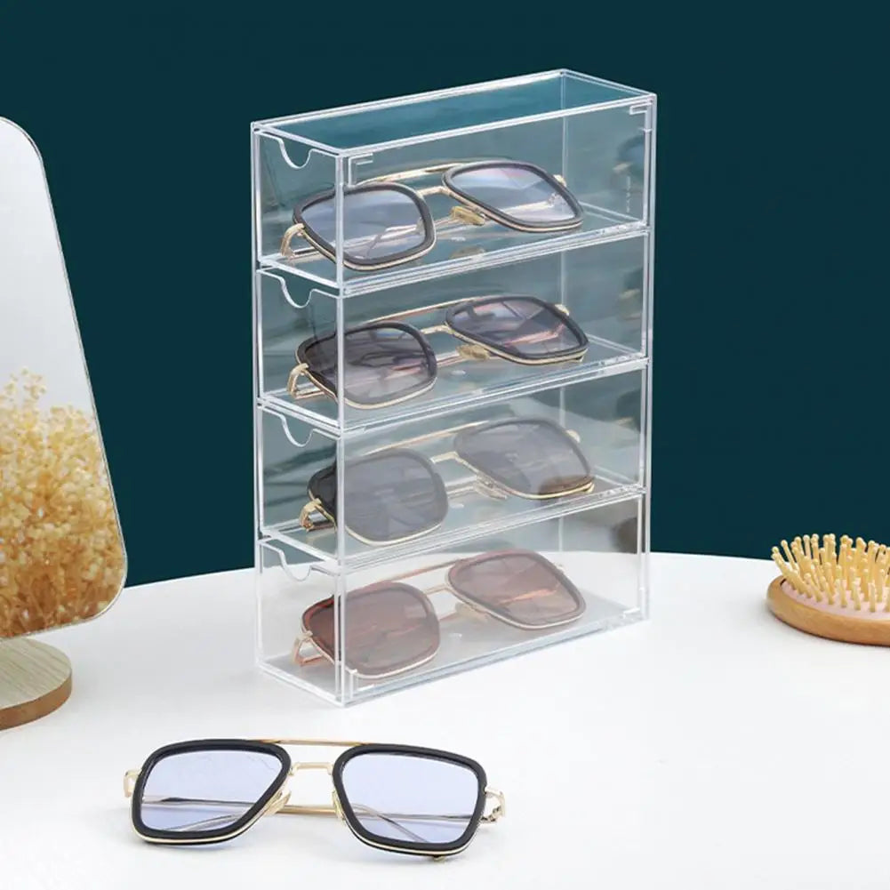 Clarify.pk clear acrylic sunglasses storage box with four drawers holding multiple pairs of sunglasses