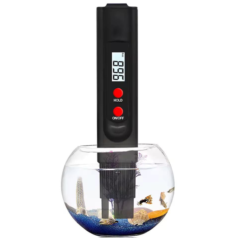 Clarify.pk black TDS meter for water testing submerged in a fishbowl measuring water quality