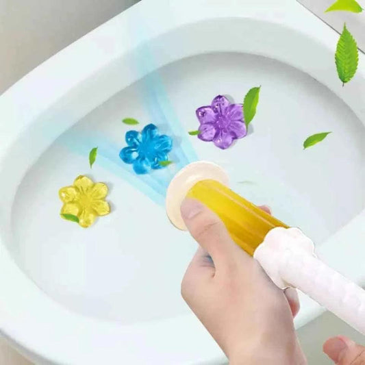 Toilet Fragrance Gel Injection showing colorful gel flowers in blue, purple, and yellow inside a toilet bowl
