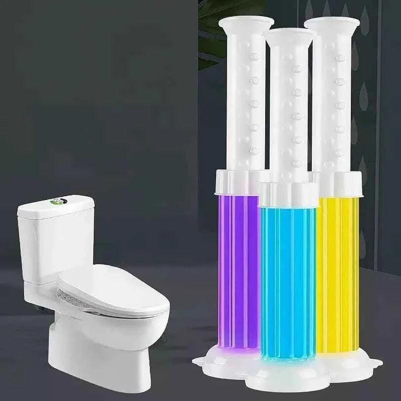 Set of colorful Toilet Fragrance Gel Injection tubes next to a white modern toilet in bathroom