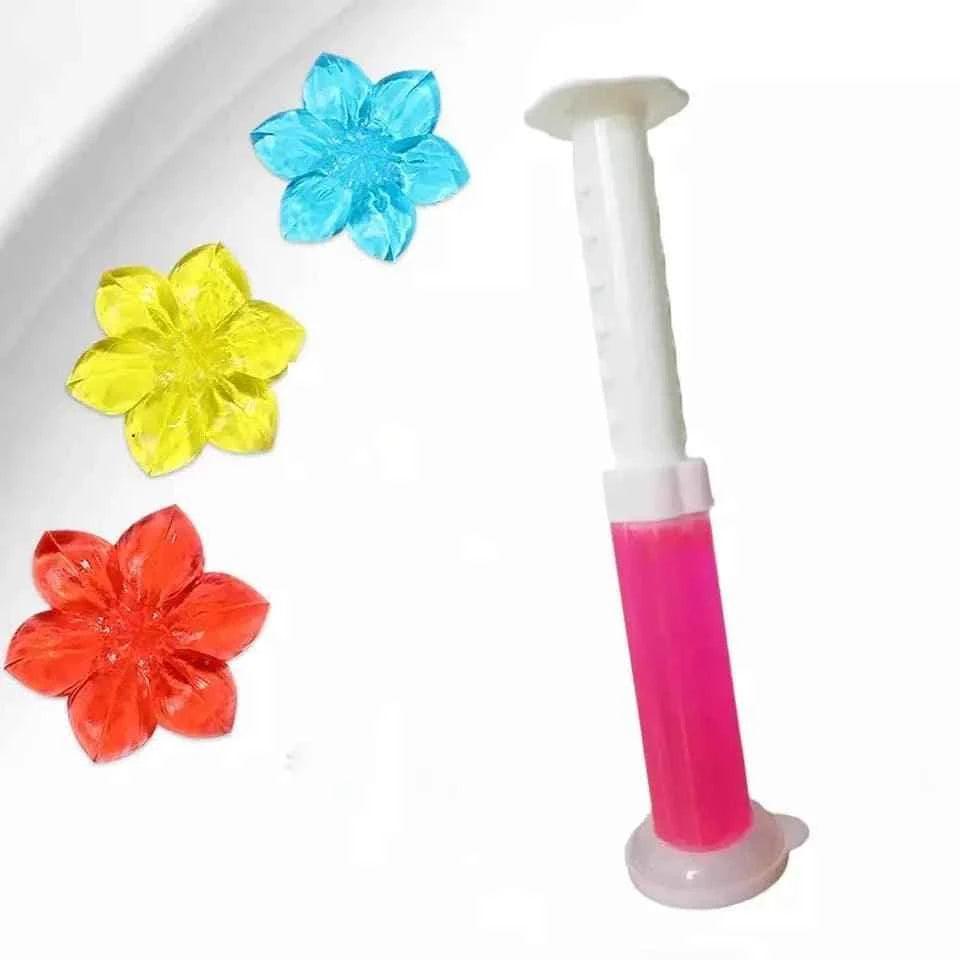 Clarify.pk Toilet Fragrance Gel Injection in pink with colorful flower-shaped gel refills for bathroom freshness