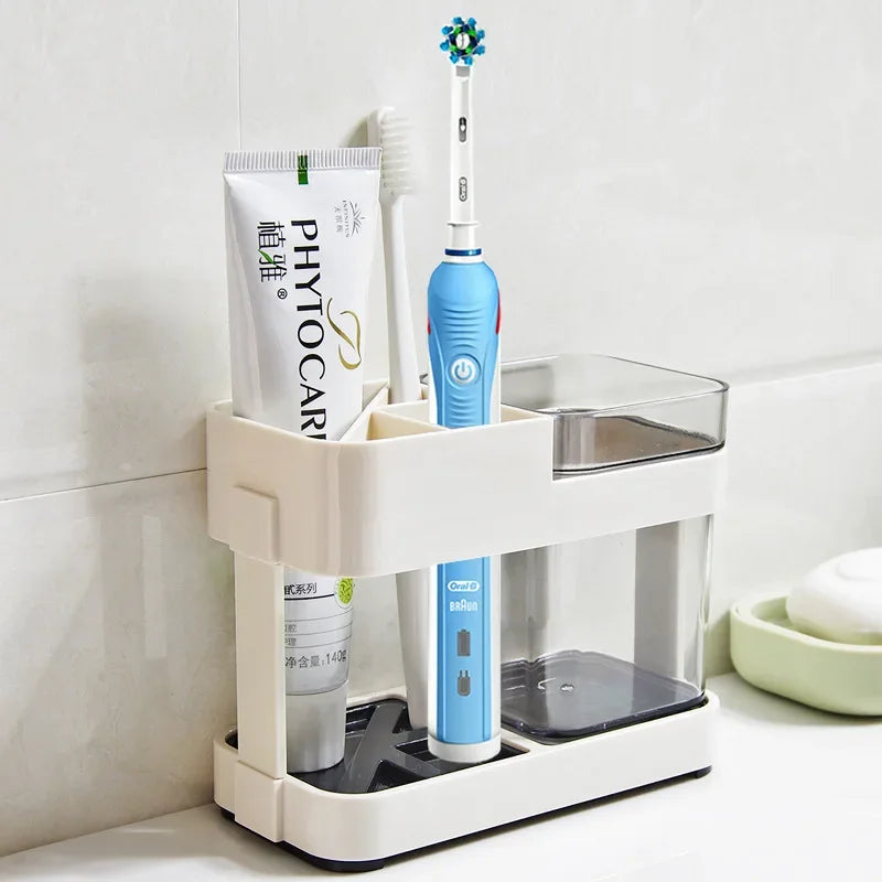 Clarify.pk white floor type toothbrush organizer holding electric toothbrush and toothpaste on bathroom counter