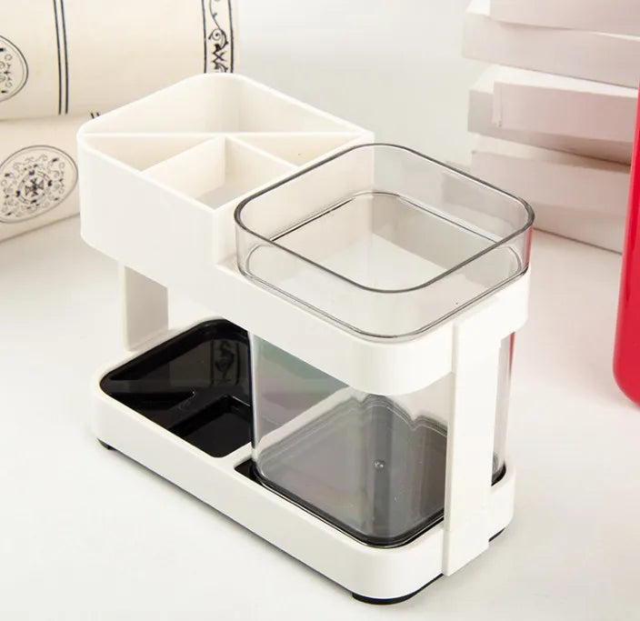 Clarify.pk white and black plastic toothbrush organizer with multiple compartments for bathroom storage