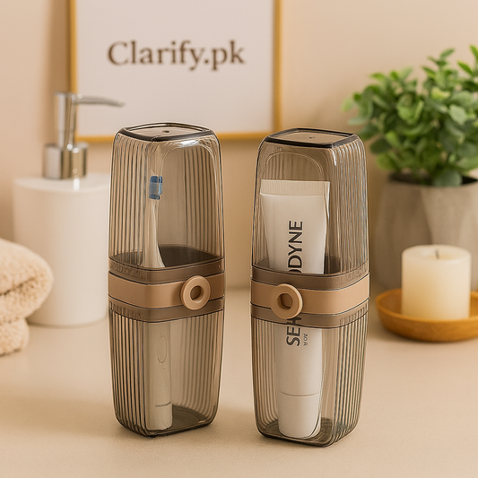 Clarify.pk toothbrush storage case in transparent smoke color holding a toothbrush and toothpaste