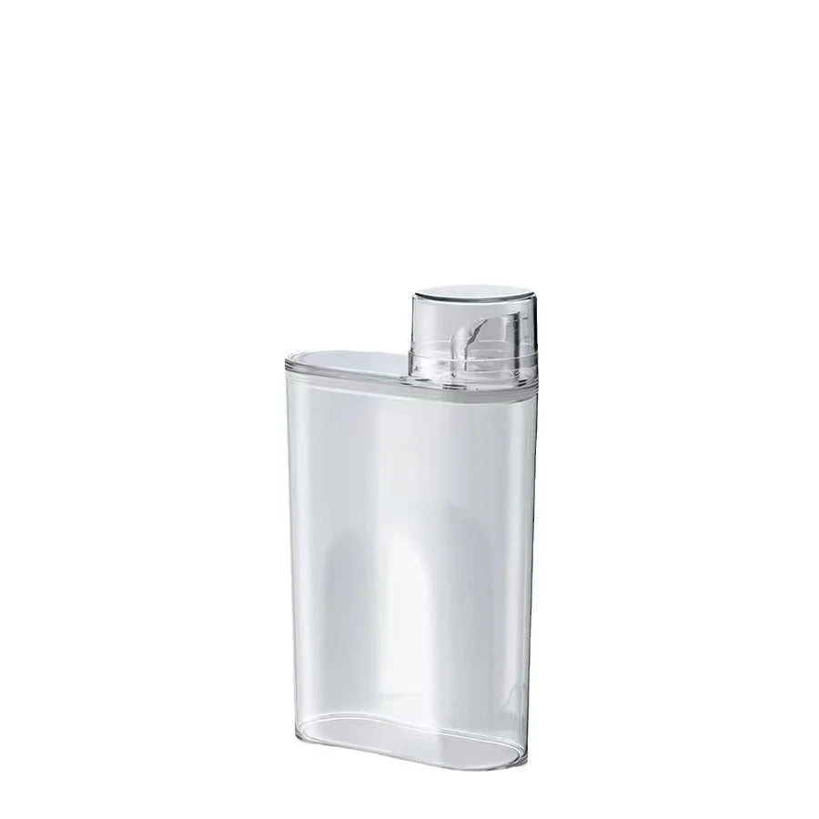Clear plastic transparent laundry detergent dispenser with measuring cap for easy pouring