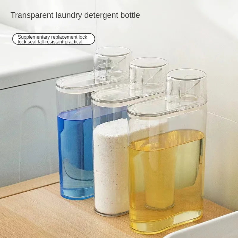 Set of three transparent laundry detergent dispenser bottles filled with blue, white, and yellow detergent liquids on a wooden surface