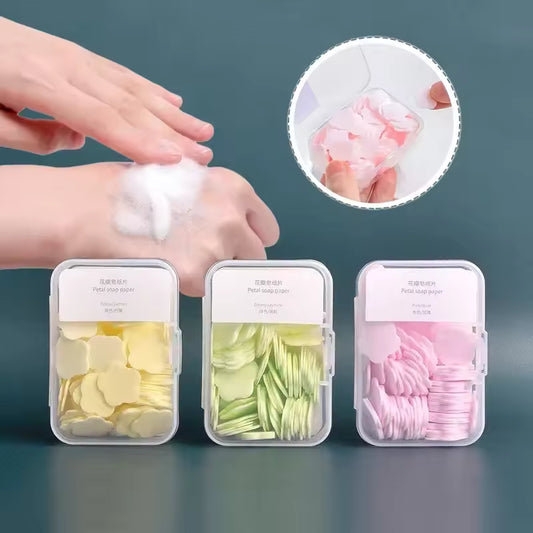 Clarify.pk travel soap paper sheets in yellow, green, and pink floral designs with foam created on hand