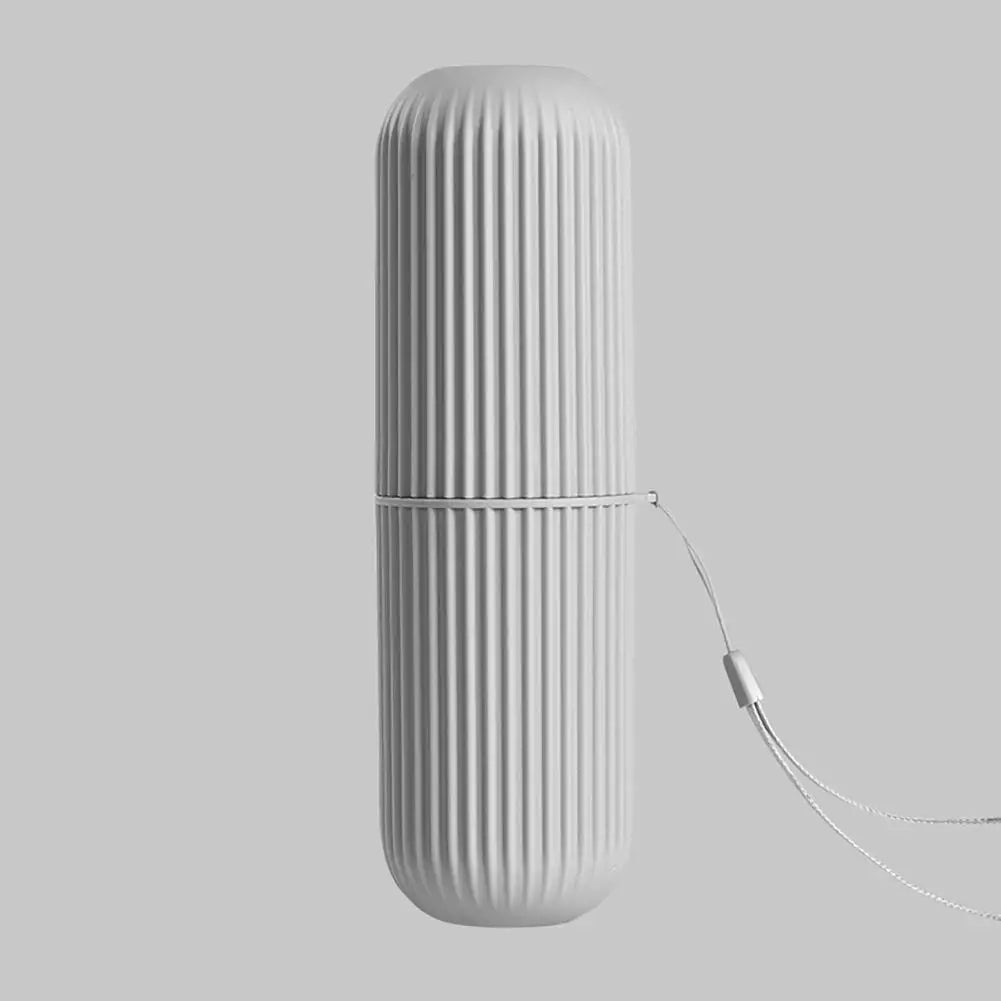 White ribbed travel toothpaste storage case with a wrist strap for easy carrying