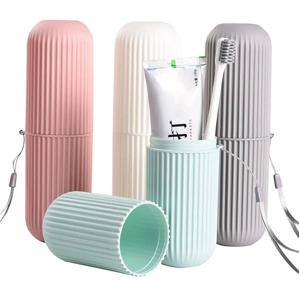 Travel toothpaste storage case set in pink white gray and mint green with ribbed design and carrying straps