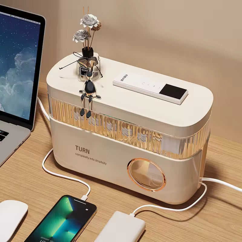 Clarify.pk cable organizer box for desk in beige with transparent window and multiple charging cables managed