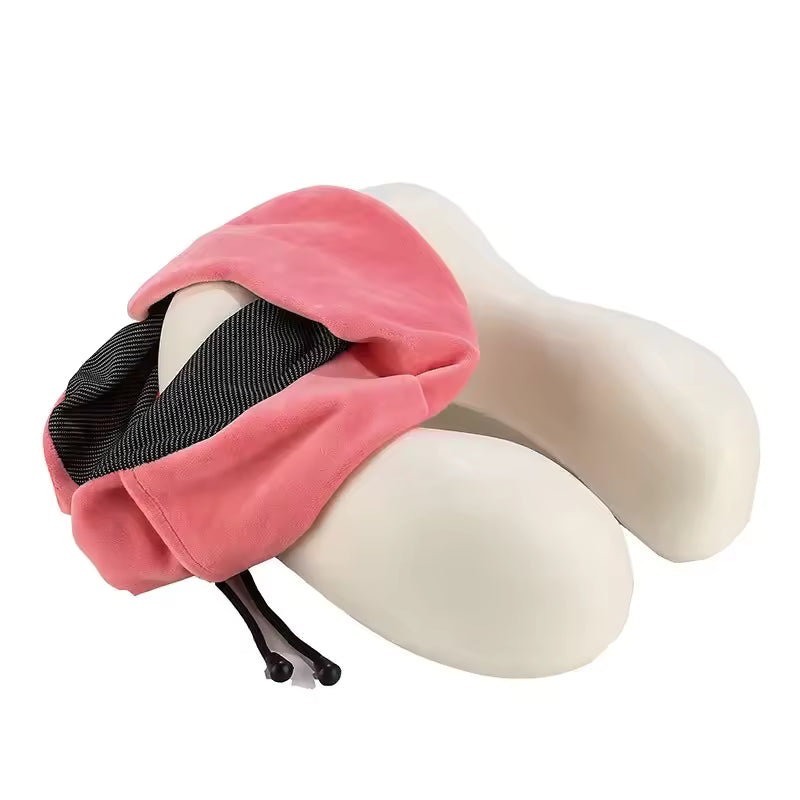 U shaped memory foam neck pillow in white with a pink travel pouch for comfortable support
