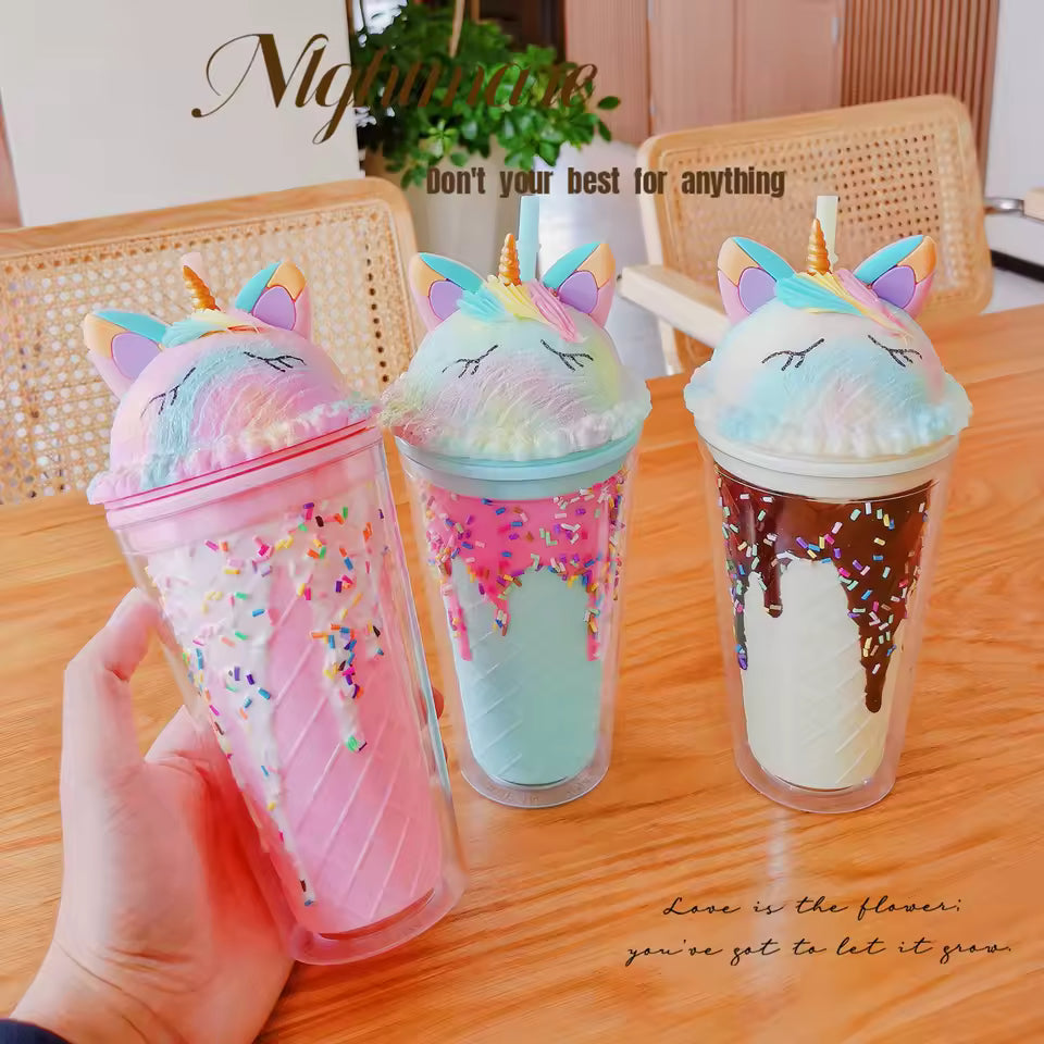 Unicorn water cup with straw in pink, blue, and white colors with rainbow sprinkles and ice cream design