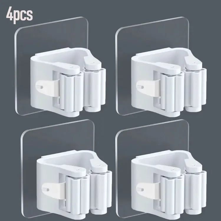 Set of 4 white broom mop wall clips mounted on transparent adhesive pads for organized storage