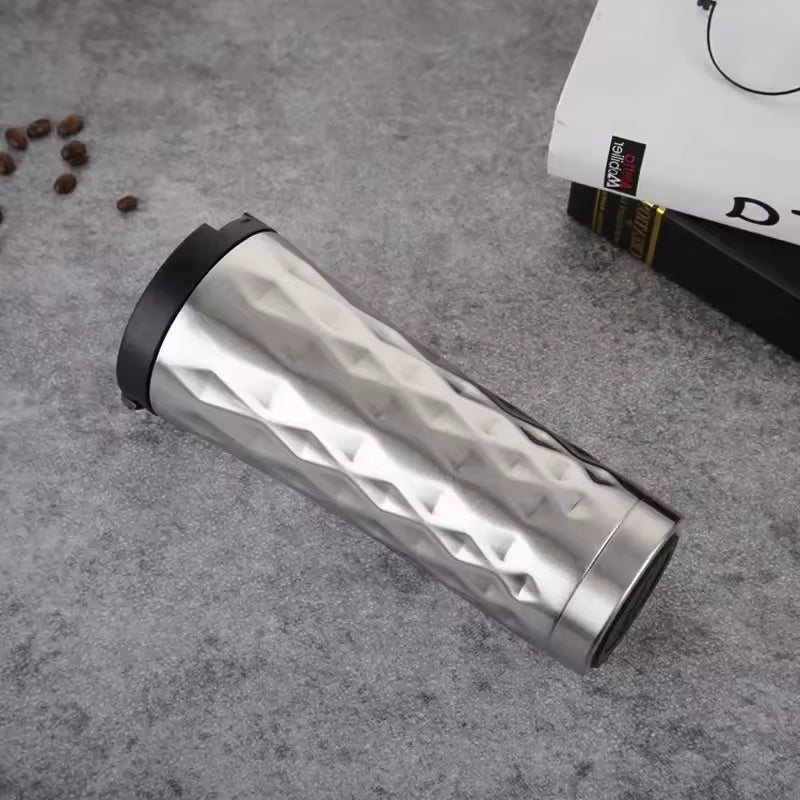 Clarify.pk 500ml insulated travel mug with textured stainless steel body and black lid