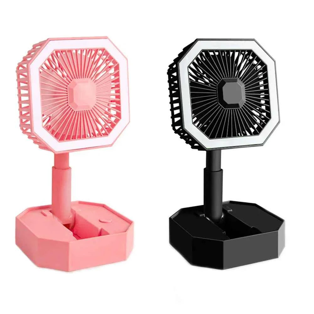 USB rechargeable mini fan in pink and black colors with a compact stand for portable use