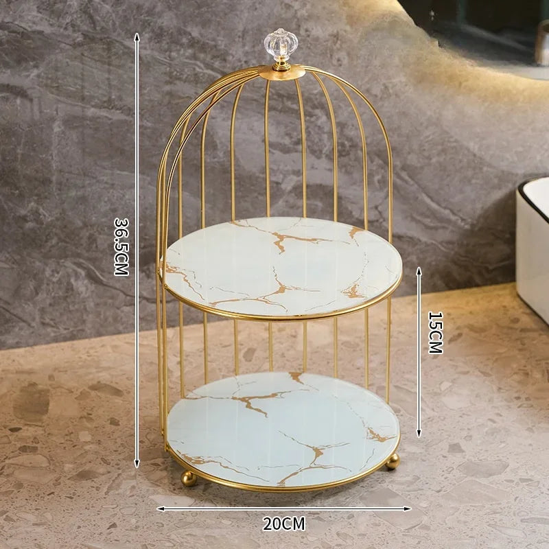 Elegant 2 tier cosmetic storage rack with gold frame and marble-patterned shelves by Clarify.pk
