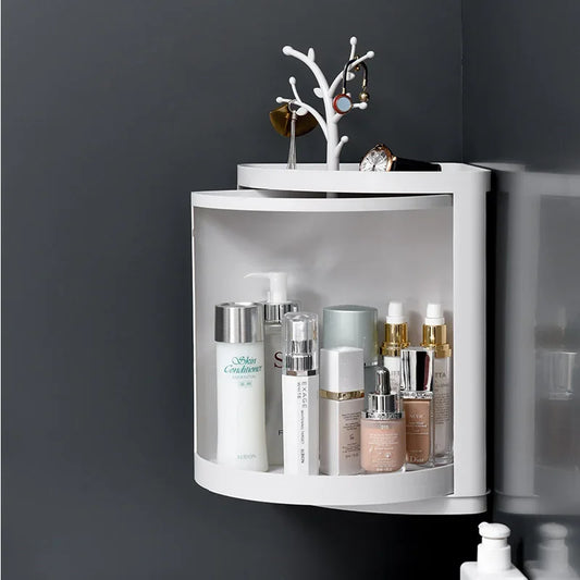 Clarify.pk 360 rotating bathroom organizer mounted on wall holding skincare and jewelry