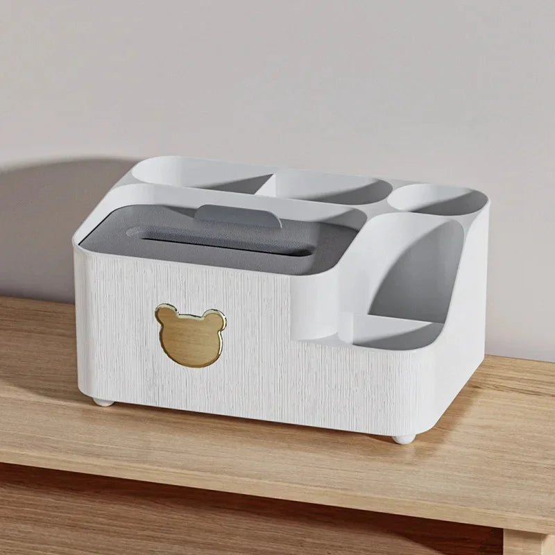 White cartoon bear tissue box organizer with multiple compartments on wooden surface