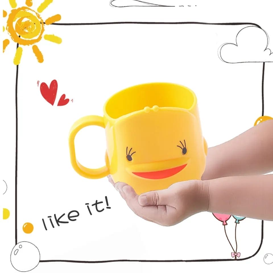 Bright yellow cute duck toothbrush cup held by hands for fun bathroom interiors