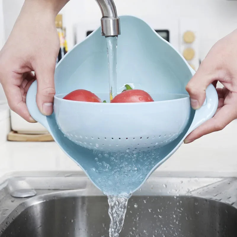 Clarify.pk double layer fruit and vegetable basket in blue used for washing tomatoes over kitchen sink