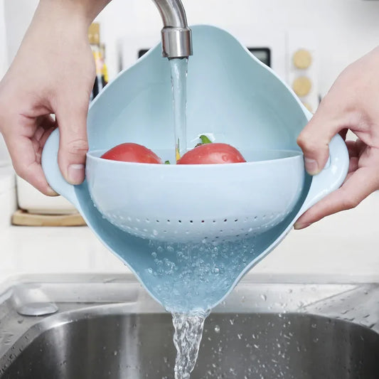 Clarify.pk double layer fruit and vegetable basket in blue used for washing tomatoes over kitchen sink