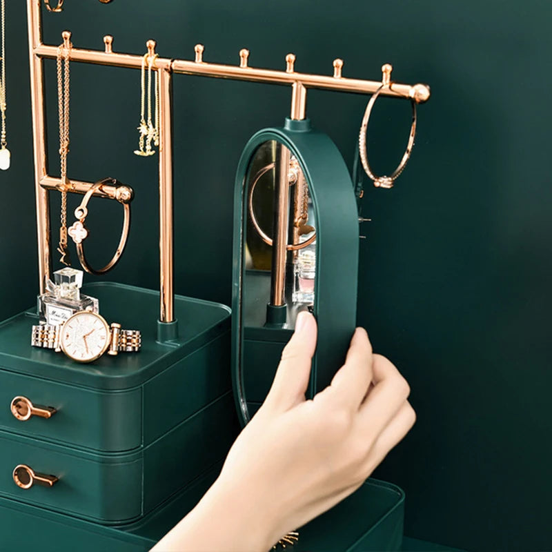 Elegant fashion jewelry display box with green drawers and gold-tone hanging rods for necklaces and bracelets