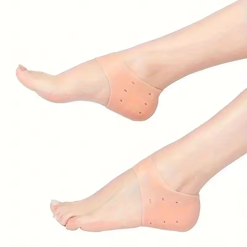 Clarify.pk silicone heel socks for cracked heels in peach color worn on both feet