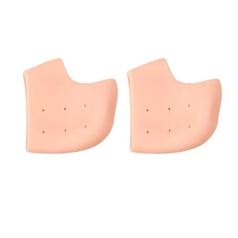 Pair of beige silicone heel socks for cracked heels with ventilation holes for comfort