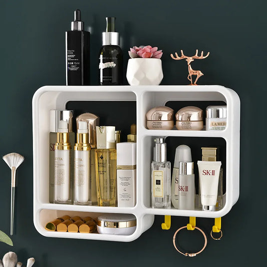 White wall mounted cosmetic organizer by Clarify.pk holding skincare bottles, creams, and jewelry on dark wall