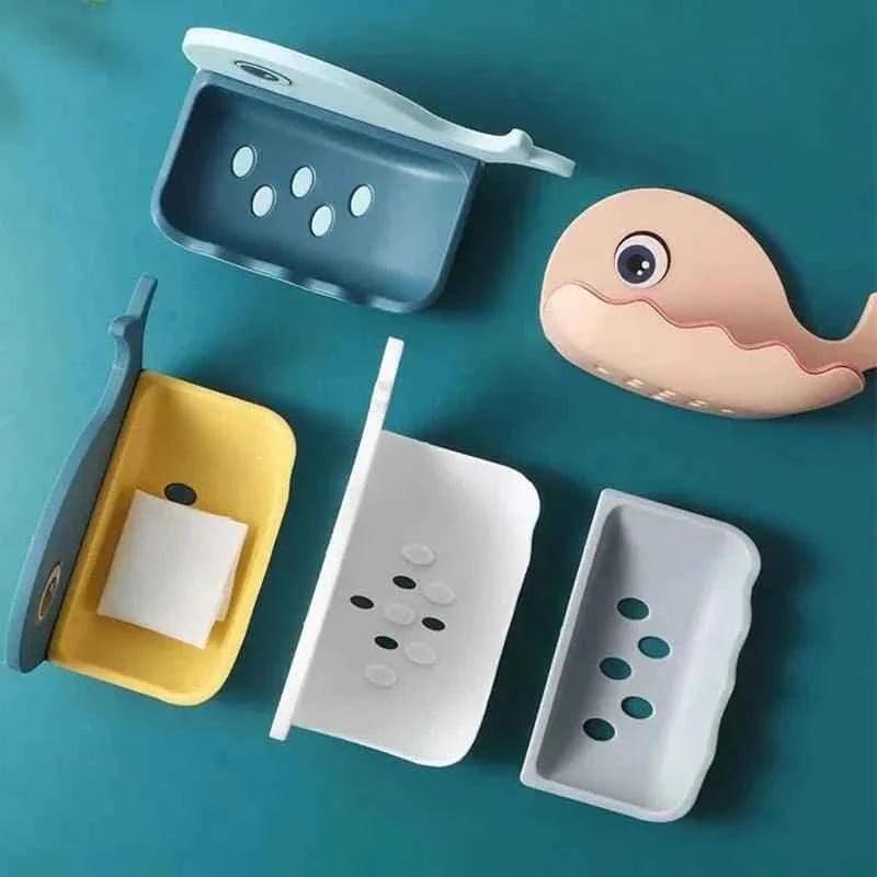 Clarify wall mounted fish soap dish in multiple colors including blue, yellow, white, gray, and a pink fish shape