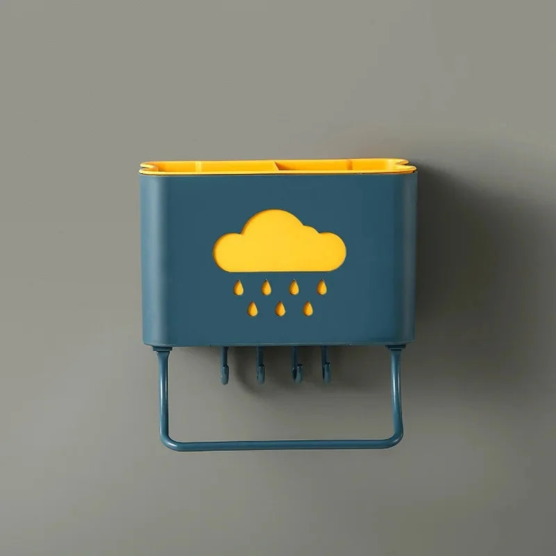 Blue and yellow wall mounted kitchen organizer with cloud design and hooks for hanging utensils