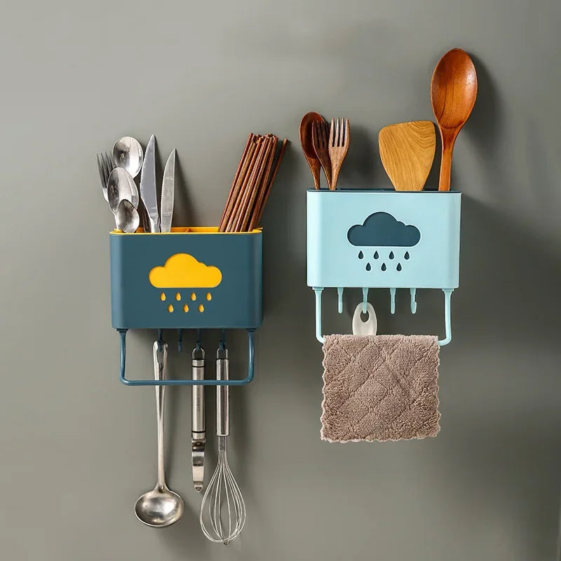 Wall mounted kitchen organizer with utensil holders and hooks for spoons, chopsticks, and towels
