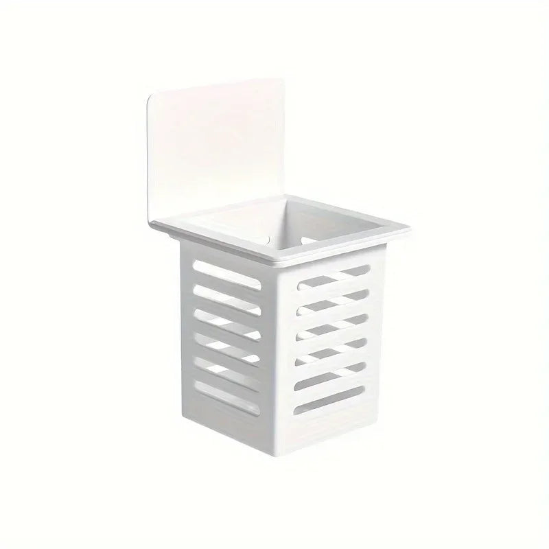 White plastic wall mounted organizer with open lid and slotted sides for storage