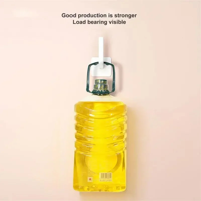 Wall mounted paper towel holder from Clarify.pk showing strong load bearing holding a large bottle
